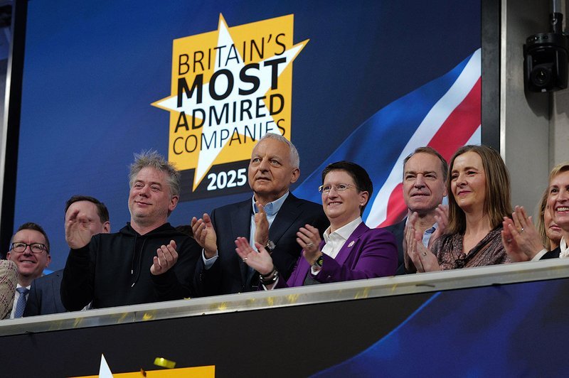 Greg Jackson receiving Most Admired Company award