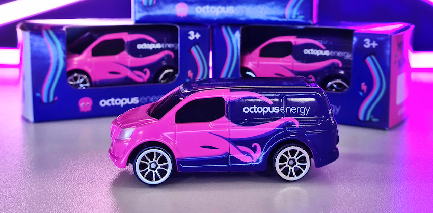 A photo of our Octopus van toys under neon lights