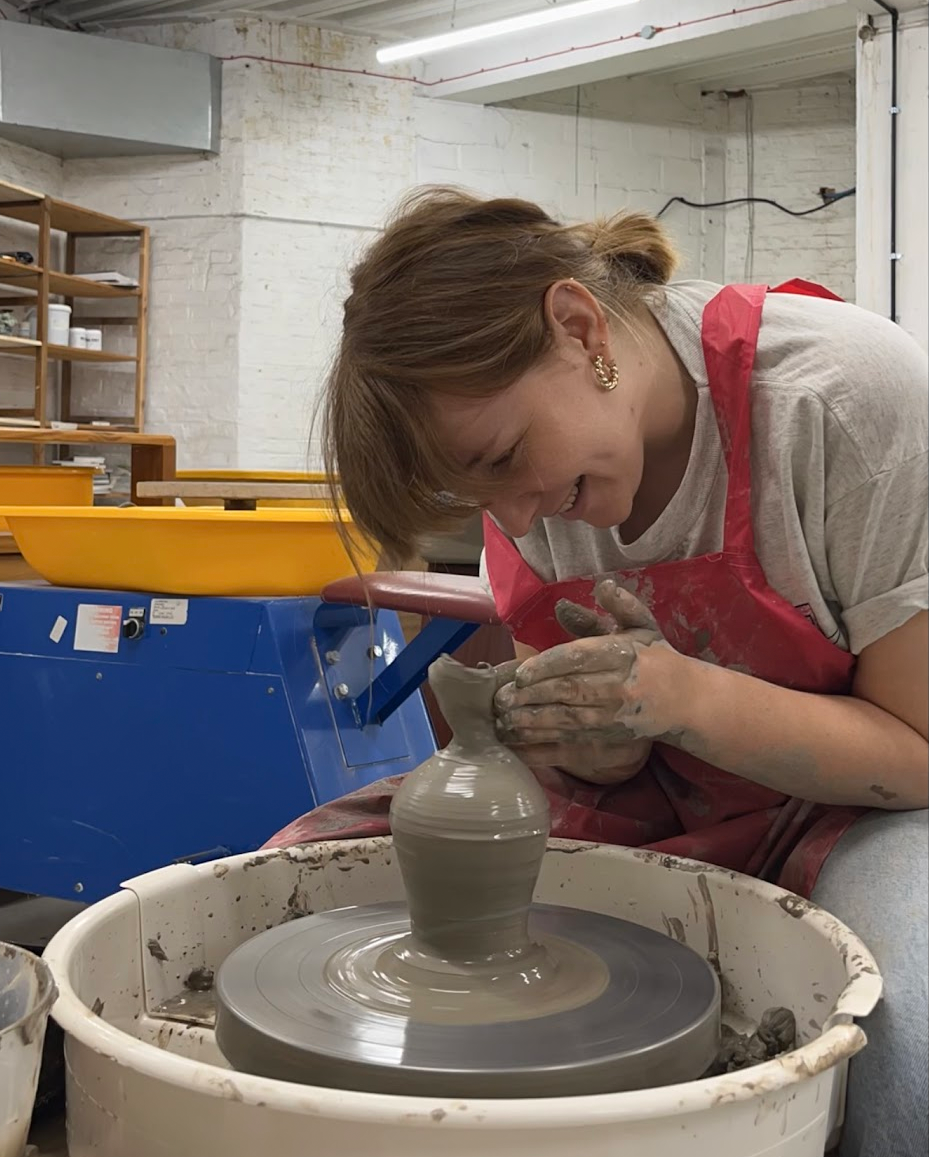 photo of Meg making ceramics