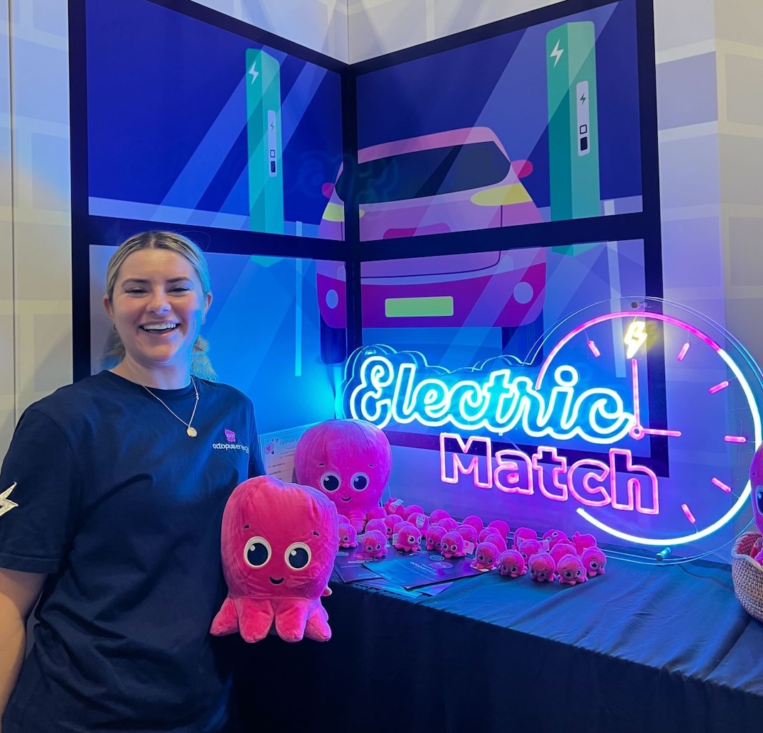 Becki with the Electric Match sign