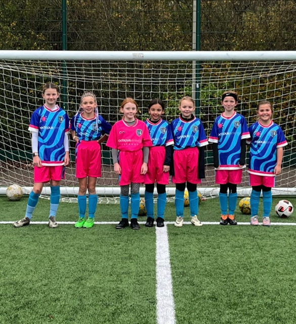 Central Girls Football Academy U12s in their Octopus Energy kits