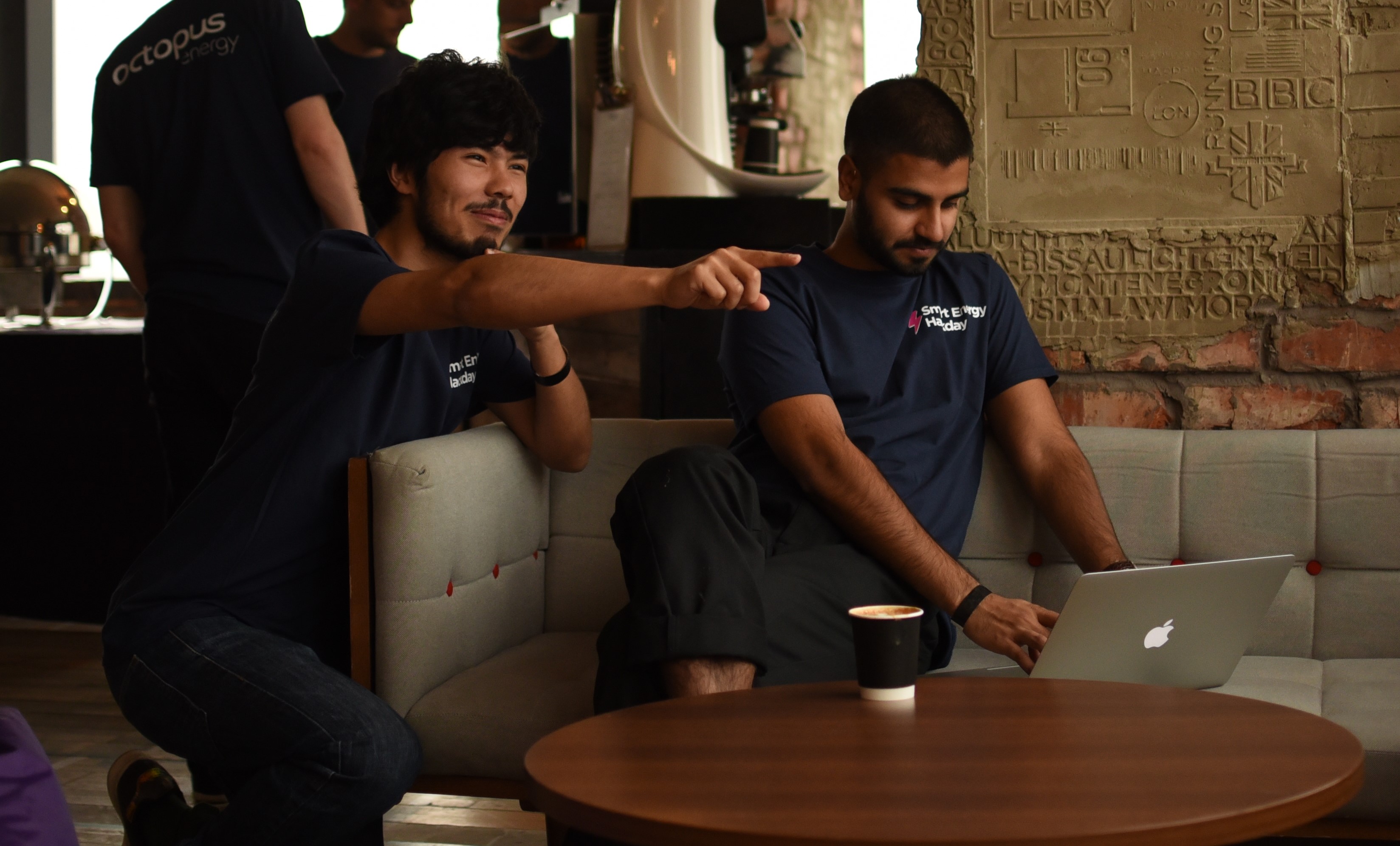 Photo of Karim pointing something out to Suraj