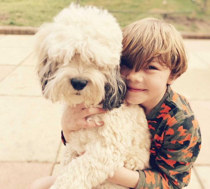 an image of kerry's son and dog