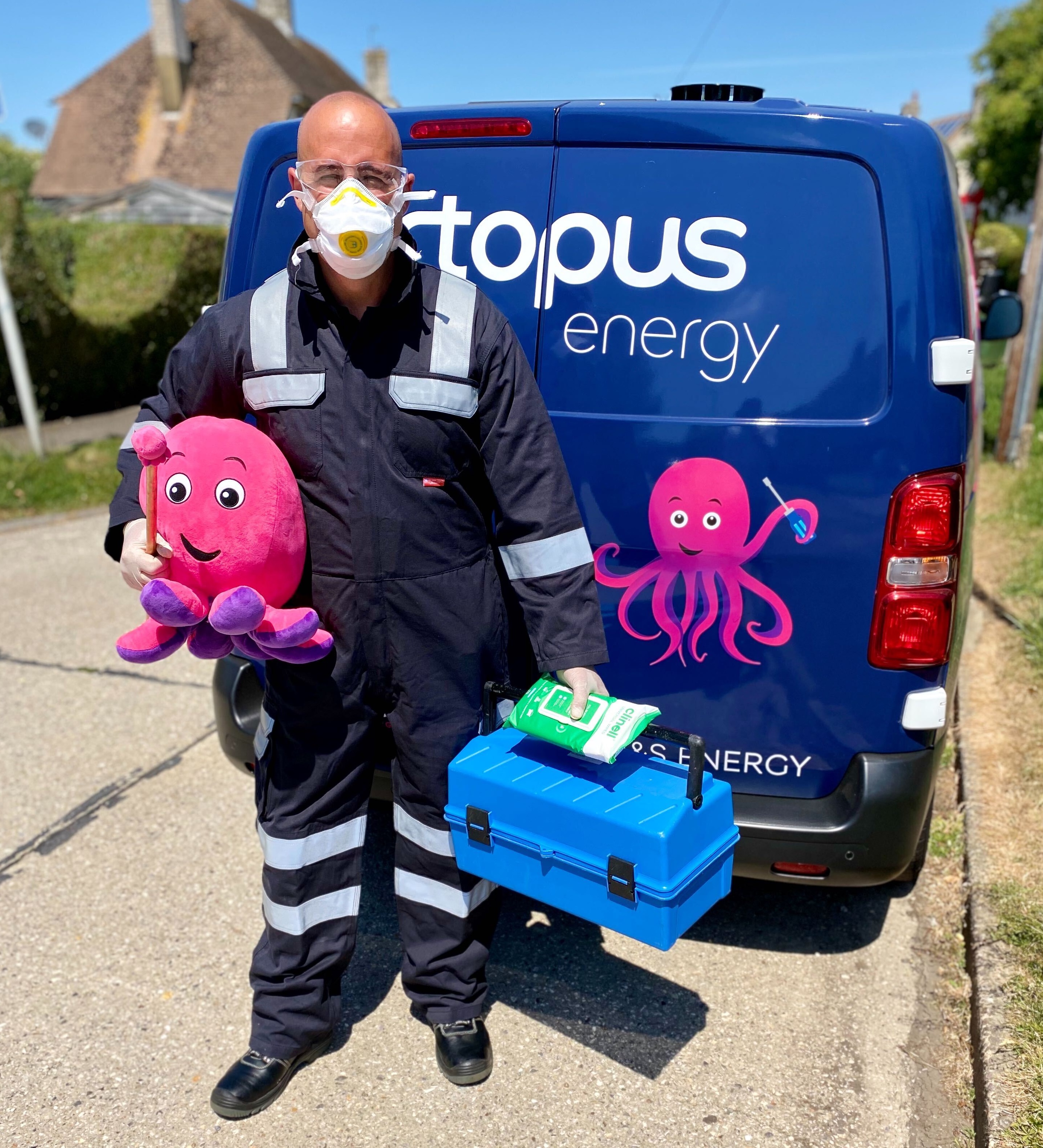 an image of cheeky, smiling Octopus Engineer in a hazmat suit