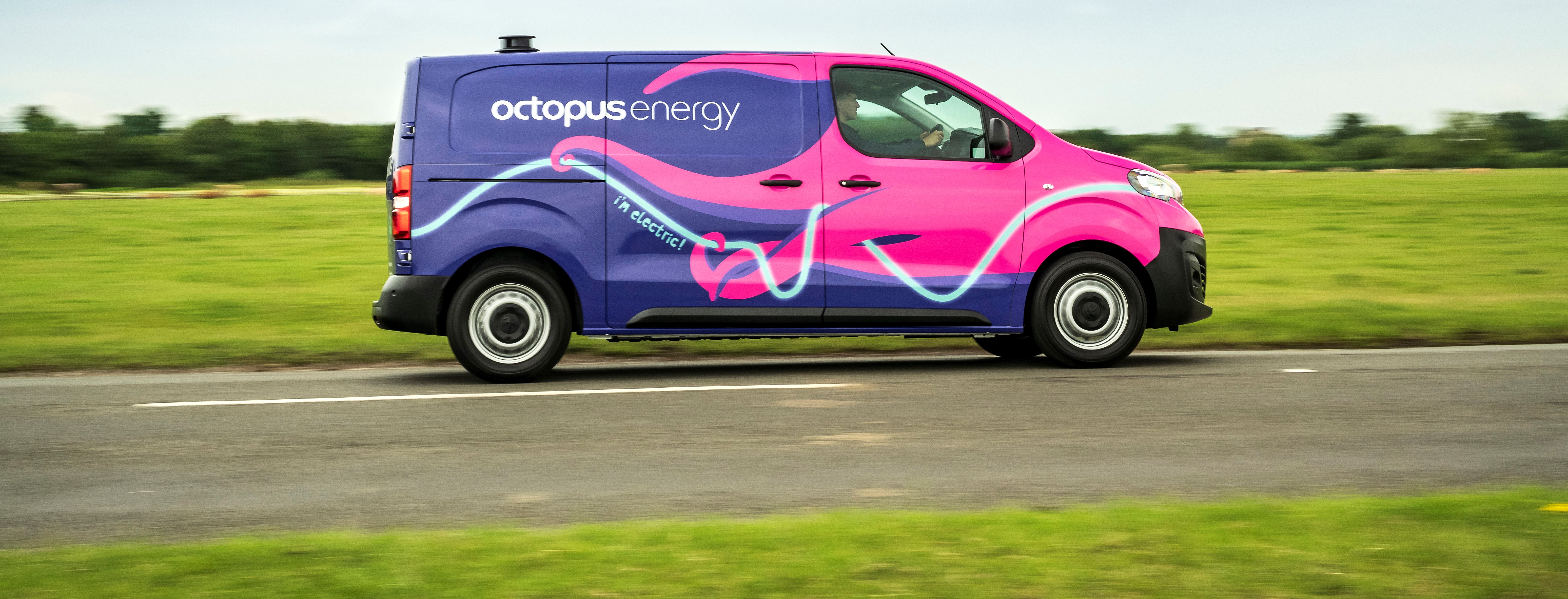 Max and Zoe from the team at Octopus Energy Services with an Octopus van