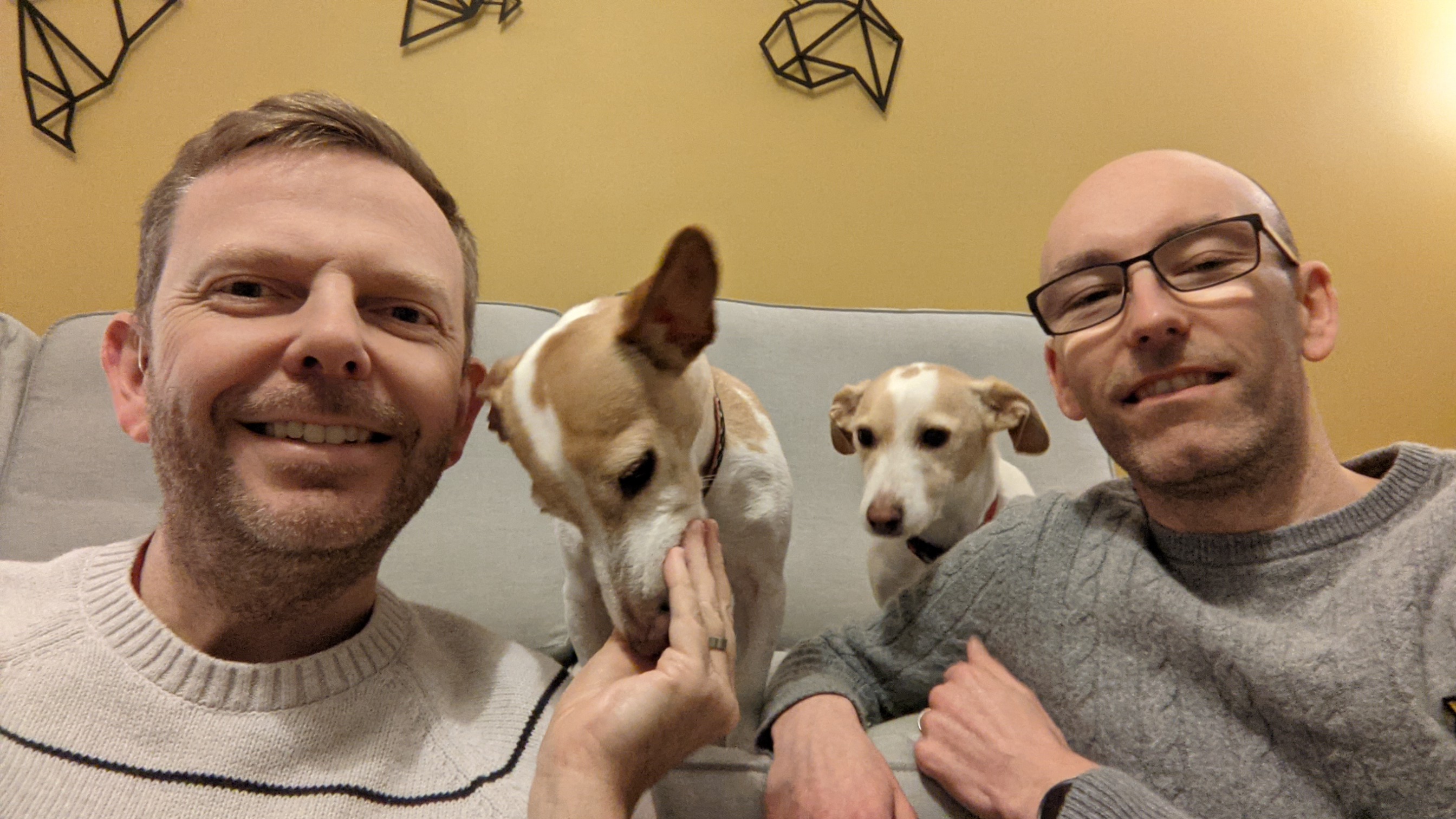 A photo of Colin and Steve and their two dogs