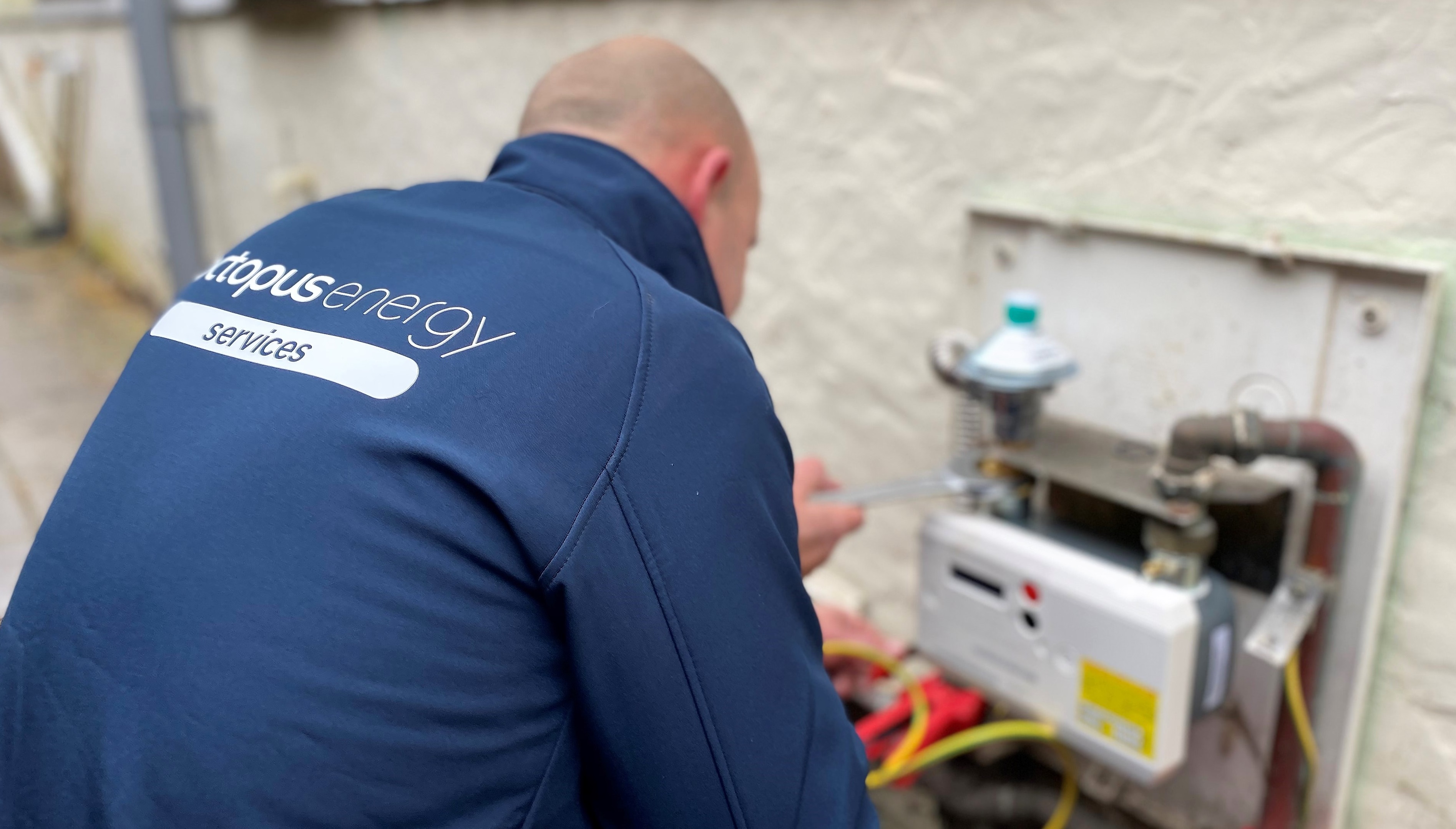 An Image of an engineer removing a gas meter
