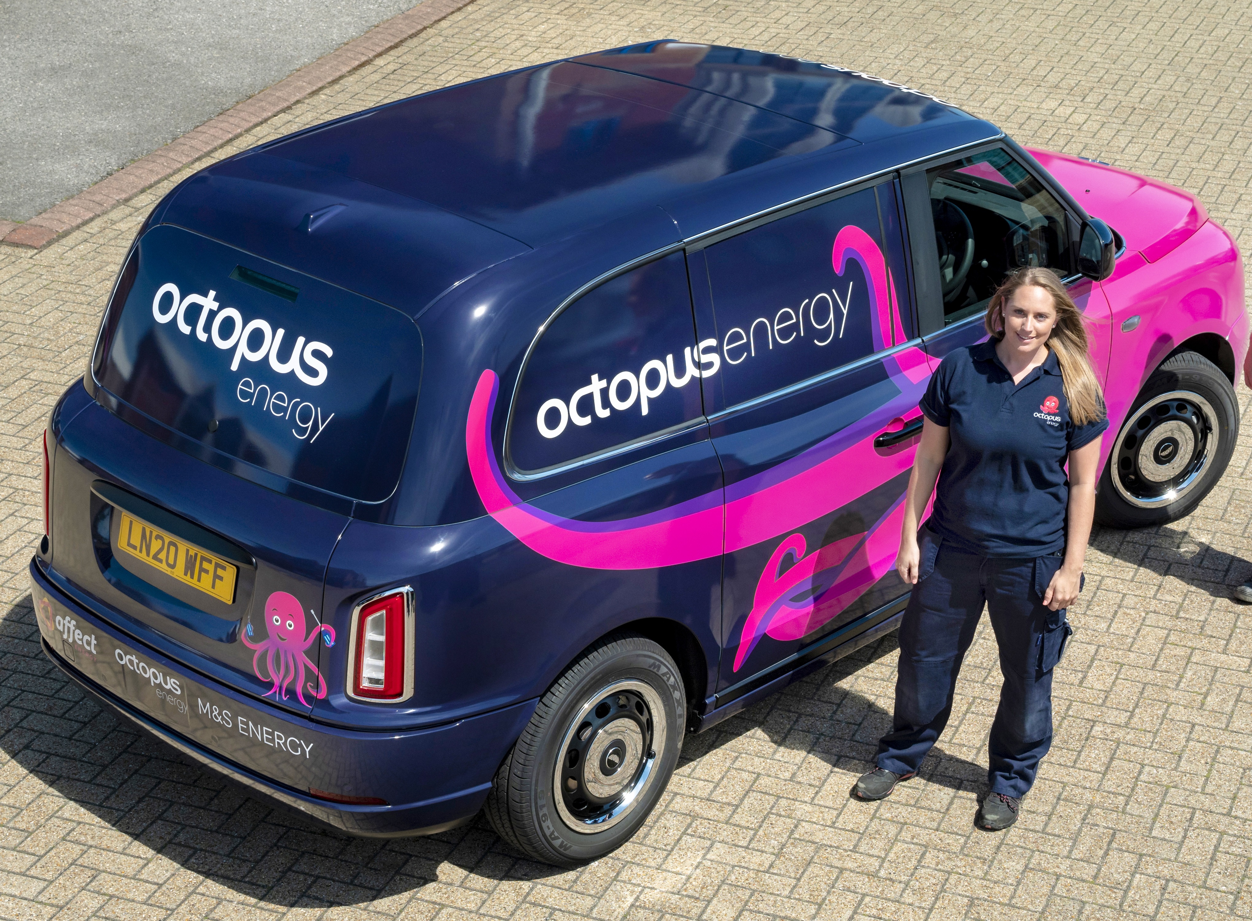 An image of zoe next to her van