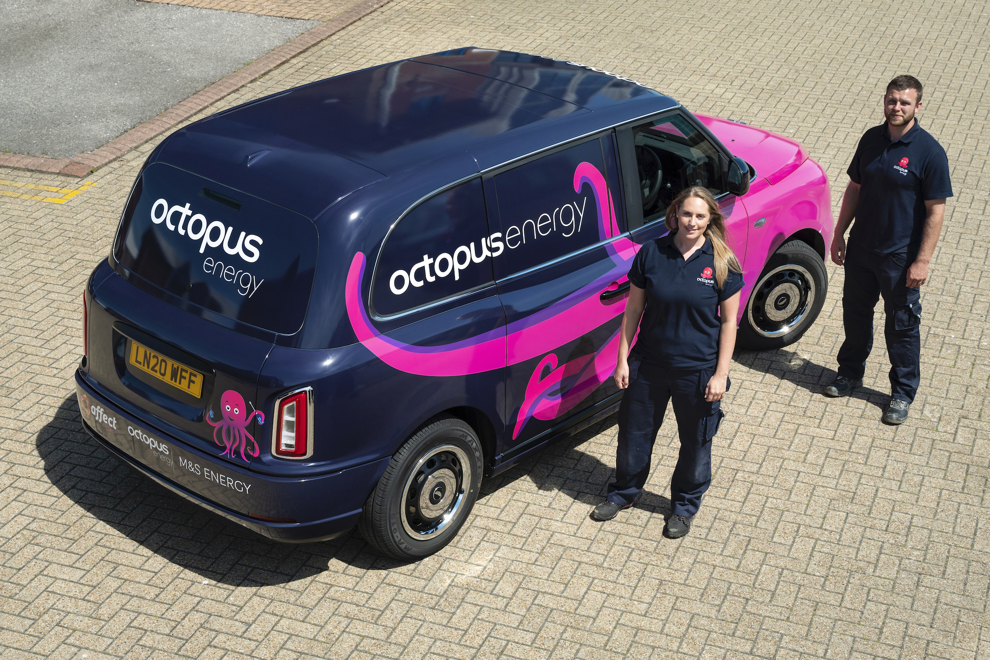 Octopus Energy Services engineers with their electric metering van