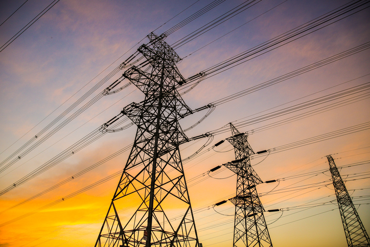 An image of pylons at sunset