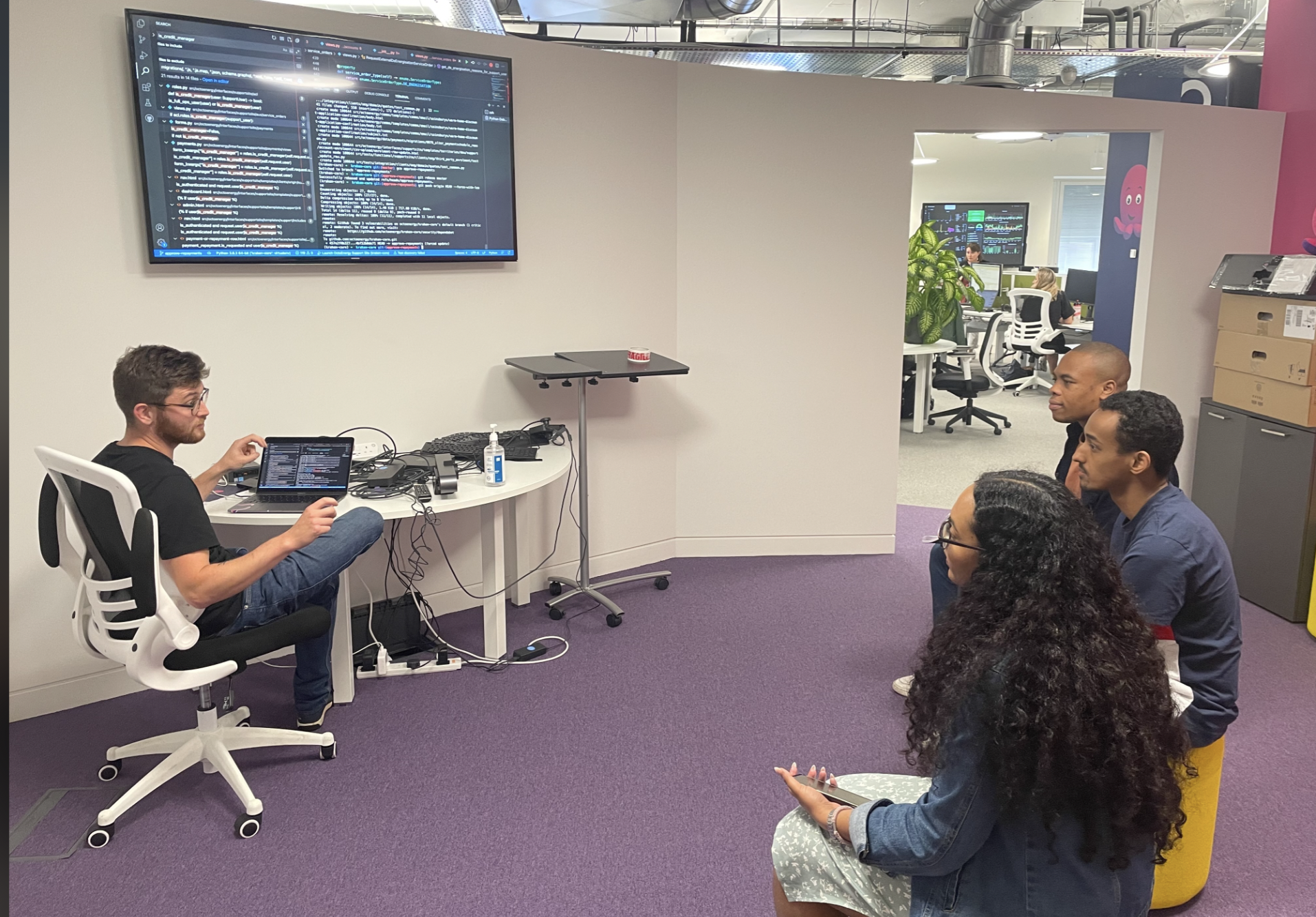 The interns learning our systems at London HQ