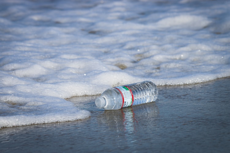 plastic bottle on seashore